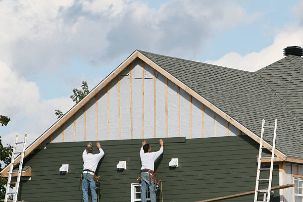 Professional Siding technician working in Clinton, NY